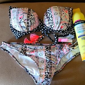Victoria's Secret bikini medium bottoms 34B top. Cute pinkl fringe on back tie.